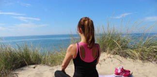 Girl doing Mindfulness Meditation To Reduce Stress